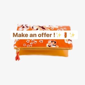 RACHEL PALLY
Leather Trimmed Canvas Fold Clutch